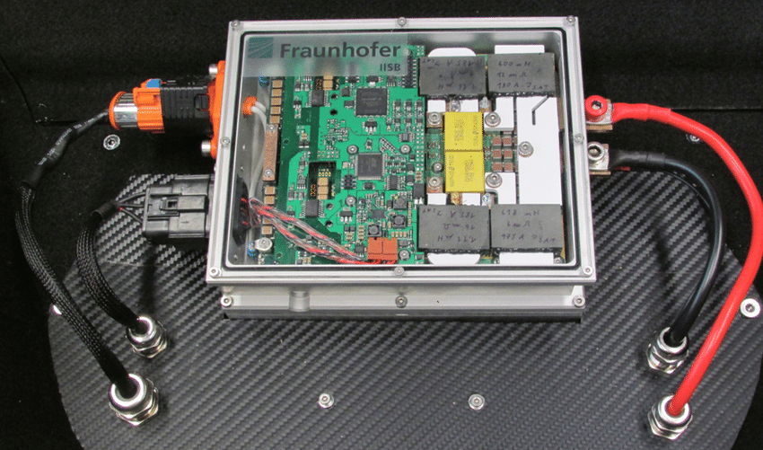 A-DCDC-converter-that-transfers-energy-from-the-HV-network-to-the-LV-network-is-located.ppm.png